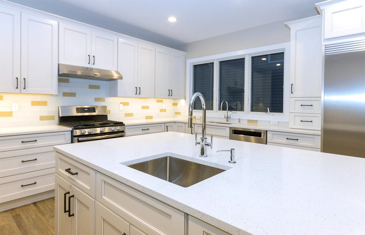 white kitchen cabinets and countertop